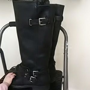Black leather knee-high boots